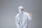 Medic in white hazmat protective suit, coronavirus illustration concept