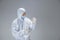 Medic in white hazmat protective suit, coronavirus illustration concept