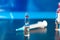 Medical ampoule and syringe.