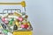 Medical background or concept. Close-up of a shopping trolley filled with colorful pills. Cart from the supermarket with different