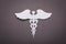 Medical background, Paper cut of Caduceus medical symbol