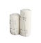 Medical bandage rolls on white. First aid items