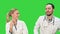 Medical collegues celebrating, dancing and singing on a Green Screen, Chroma Key.