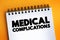 Medical Complications text quote on notepad, concept background