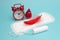 Medical conception photo. Red dreamy smile crochet blood drop, daily and menstrual pad and tampon. Woman critical days, gynecologi