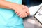 Medical doctor with a stethoscope around his neck shaking hand with colleague