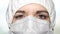 Medical doctor woman with suit and protective mask against the virus. Public health concept