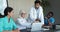 Medical employees, professional working together in conference room using laptop