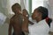 Medical examination at a boy by a female doctor