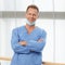 Medical expertise you can trust. Confident mature doctor in blue