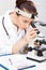 Medical - Female Nurse Looking In Microscope