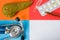 Medical or health care design concept photo-organ pancreas, diagnostic medical tool stethoscope and medications pills and via