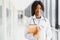Medical Internship Concept. Portrait Of Young Black Female Doctor Student In White Coat