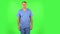 Medical man says wow in disgust, negatively waving his head. Green screen