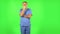 Medical man thinks about something, no idea. Green screen