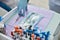 Medical person putting down dental syringe on a table