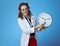 Medical practitioner woman listening with stethoscope clock