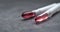Medical precision - Close-up of two syringes with red liquid, ready for use