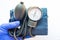 Medical professional, nurse or doctor holds in hand, wearing blue medical glove, blood pressure meter for measures blood pressure