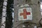 Medical Red Cross Emergency Symbol Painted on Tree Trunk Forest