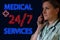 Medical services 24 by 7 concept. Neon glowing signboard and doctor women with phone and stethoscope answers an emergency call