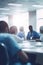 Medical Staff Meeting in Bright Conference Room with Blurred Figures