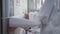 Medical staff in ppe suit washing hand on the sink using disinfected soap, prevent bacteria virus, Corona covid-19 , killing germs
