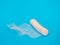 Medical sterile bandage on blue background