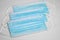 Medical sterile disposable masks. Blue medical masks on a white background.