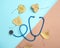 Medical stethoscope and autumn leaves