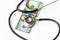 Medical stethoscope on hundred dollar banknote money on white background. Concept of health care costs, finance, health