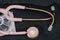 Medical stethoscope.Pink medical stethoscope.The concept of healthcare