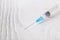Medical Syringe needle injector on white