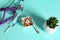 Medical syringe, pill, stethoscope and flask on a blue background closeup