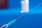 Medical syringe and vaccine on blurred background