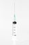 Medical syringe on white background