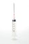 Medical syringe on white background.