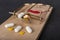 Medical tablets placed in a mousetrap. A trap for people in the form of pharmaceuticals