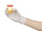 Medical theme: doctor\'s hand in white gloves holding a transparent container with the analysis of urine on a white background