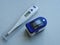 Medical thermometer and Portable pulse oximeter close-up