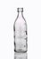 Medical transparent glass bottle with with measuring scale 200 milliliters isolated on a white background