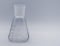 Medical transparent test tube on a gray background