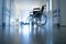 Medical wheelchair in the hospital corridor