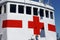 Medical white ship with a red cross in port. battleboat or warship medical help