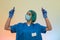 Medical worker in protective costume holding red test tubes in hands in laboratory