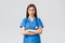 Medical workers, healthcare, covid-19 and vaccination concept. Serious and determined professional female nurse, doctor