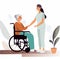 medical workers or volunteer taking care of an elderly person in a wheelchair