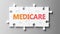 Medicare complex like a puzzle - pictured as word Medicare on a puzzle pieces to show that Medicare can be difficult and needs