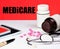 Medicare. The inscription on the background of medicines.