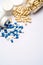 Medications capsules in plastic bottles on light grey background